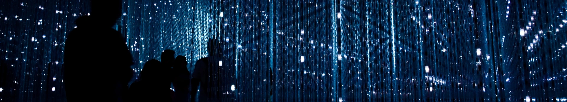 Group of people in a futuristic atmosphere, symbolizing innovation and technology
